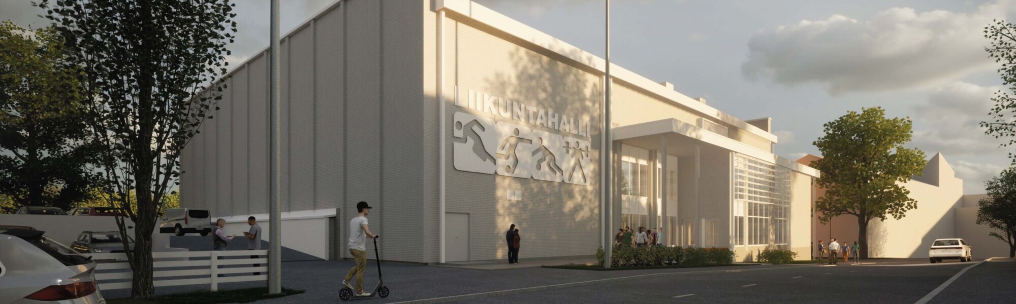 Havainnekuvassa vaaleansävyinen liikuntahallirakennus.